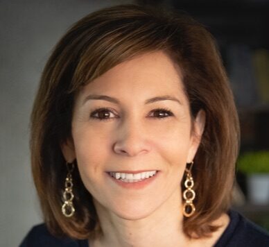 Portrait headshot of Leslie Rasmussen